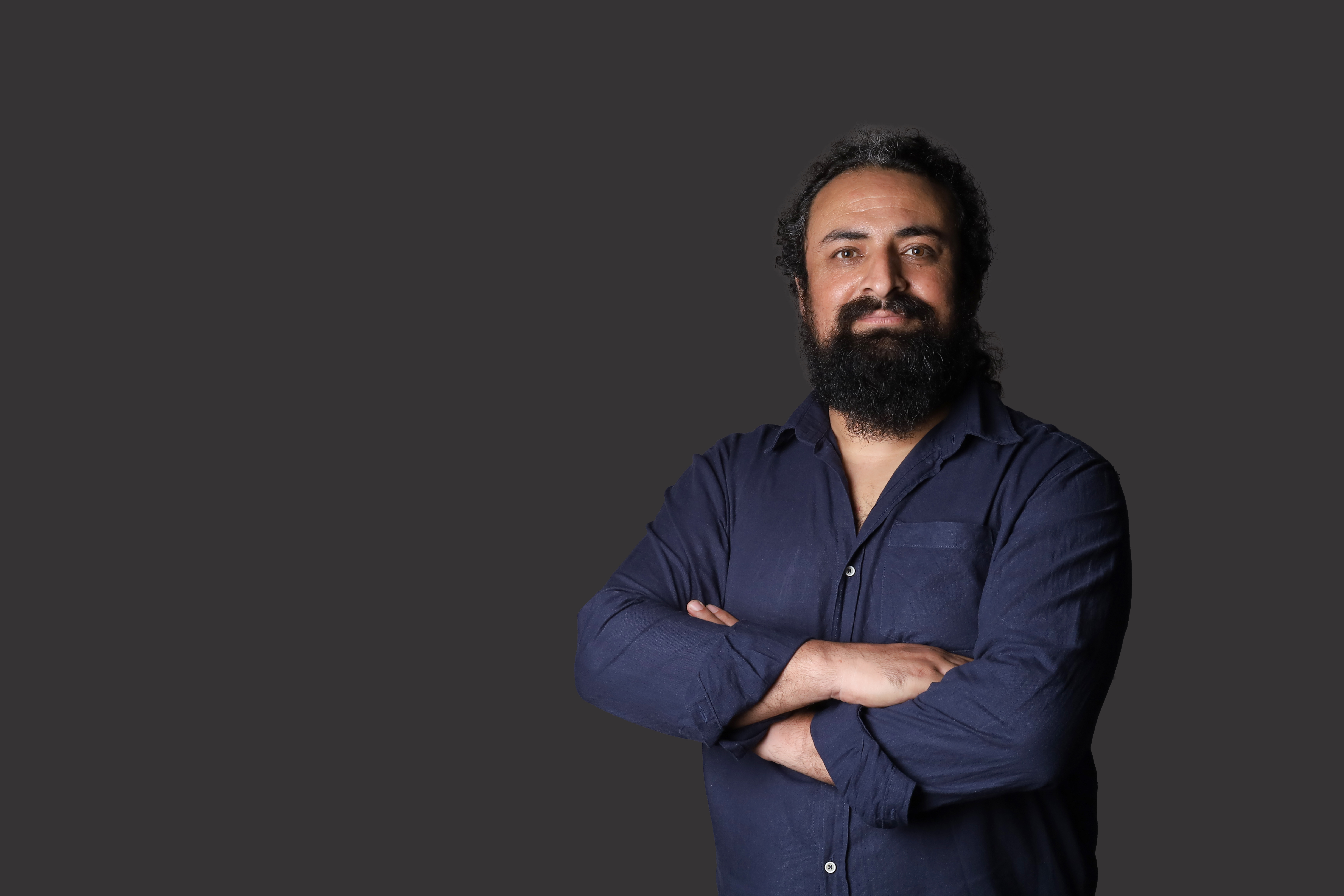 Karamat Ali — Founder & Director